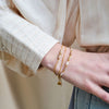 Label kiki golden hour bracelet gold stainless steel goud armband fijne pareltjes aardetinten